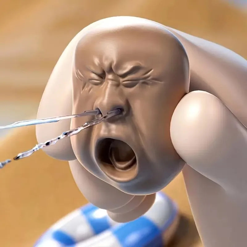 Mini Yawning Face Water Splash Toy